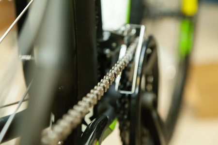 Chain bike in a blurred background of the rear wheelの写真素材