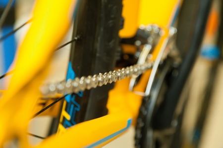 Chain bike in a blurred background of the rear wheelの写真素材