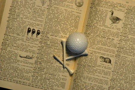 dictionary, golf ball and tees 3の写真素材