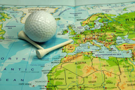 map with golf ball and tees by British Islesの写真素材