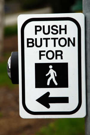 sign warning to push button to walkの写真素材