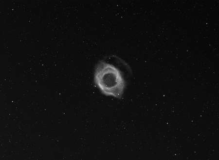 The Helix Nebula, also known as The Helix, NGC 7293, is a large planetary nebula located in the...