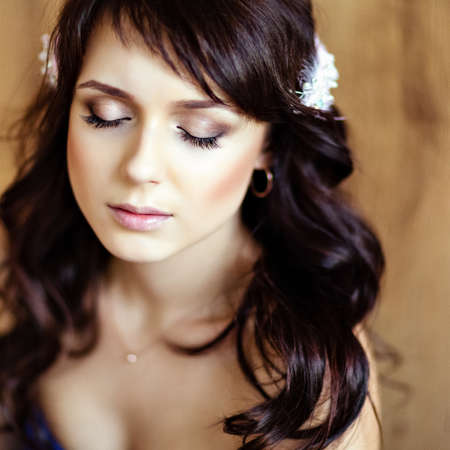 portrait of a very cute sensual beautiful girls brunette with eyes closed, close-upの写真素材