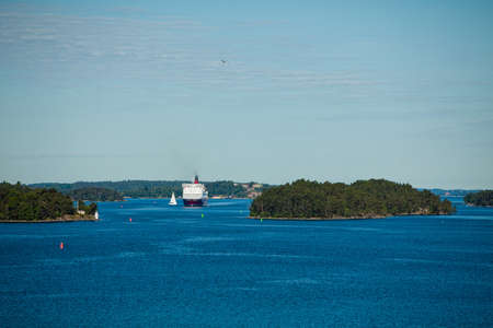 The ship sails in blue oceanの写真素材