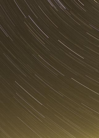Movement of the stars at nightの写真素材