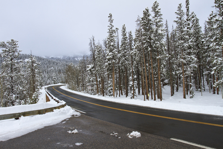 An icy road in winter snow conditionsの写真素材