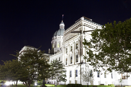 A view of the beautiful Indiana statehouse in Indianapolis, IN at nightの写真素材