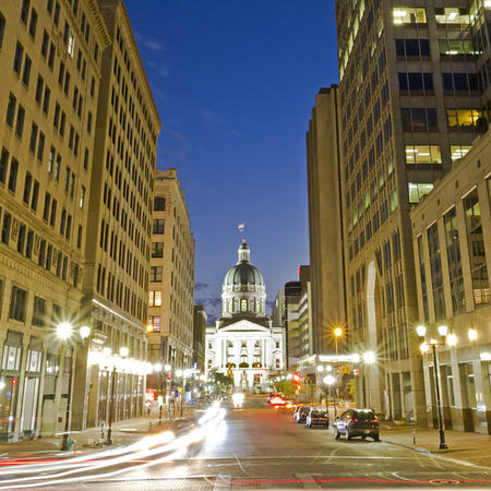 Indiana statehouse at night, long exposure with busy city streets in downtown Indianapolis, INの写真素材