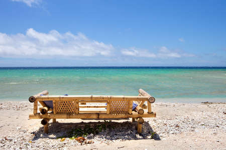 Seats on a tropical beach の写真素材