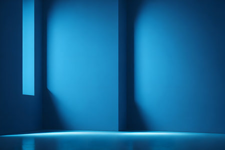 Blue empty room with light and shadow on the wall.の素材