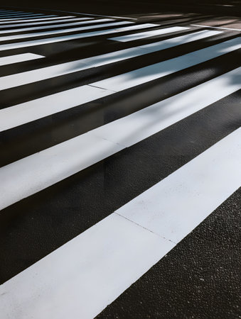 Black and white stripes on a pedestrian crossing. Perspective view of a pedestrian crossing.の素材