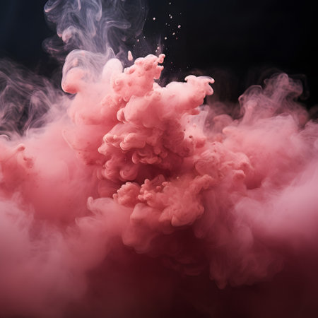 Pink and red cloud of smoke on black background. Copy space.の素材