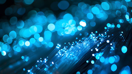 fiber optical network cable close up with blue bokeh backgroundの素材