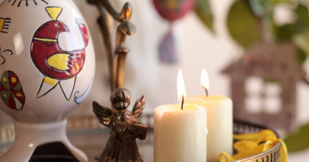 Handcrafted Easter decorations create a festive atmosphere with a painted egg, a serene angel...