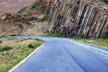Winding road in mountains の写真素材