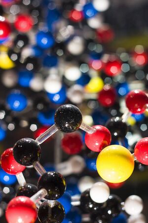 DNA model strands on abstract background の写真素材