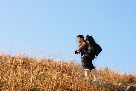 Sport hiking in mountains, walking and backpacking の写真素材