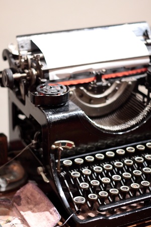 Antique type writer on table