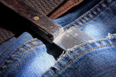 knife in jeans pocket 