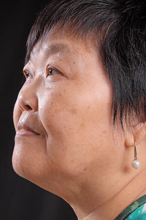 asian woman on black background の写真素材