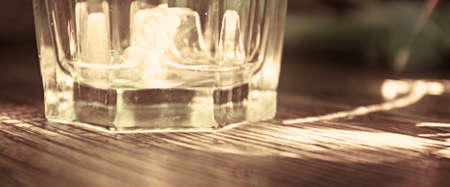 It is a rock glass on the tableの写真素材