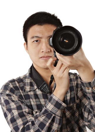 Male photographer holding cameraの写真素材