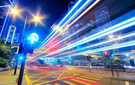 Modern Urban City at Night with Freeway Trafficの写真素材
