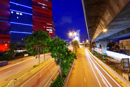 moving car with blur light through city at night 
