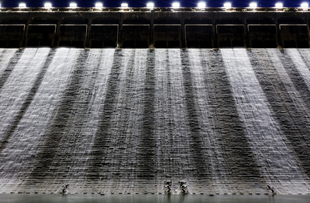 Dam at night and discharge flood water, hong kongの写真素材