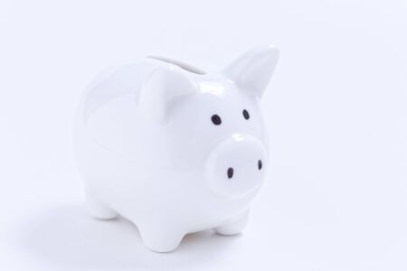 White piggy bank on white background.の写真素材