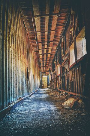 Old abandoned ruin factory damage building inside , hong kong