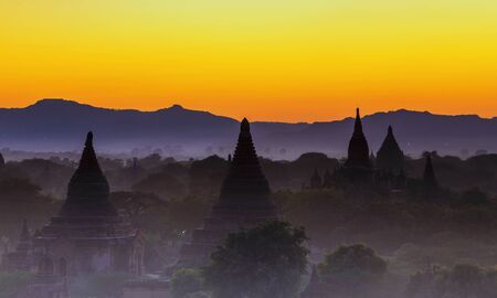 Scenic view of ancient Bagan temple during golden hour の写真素材