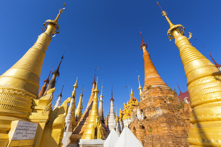 Ruins of ancient Burmese Buddhist pagodas Nyaung Ohak in the village of Indein on Inlay Lake in Shan State, Myanmar, Burma)の写真素材