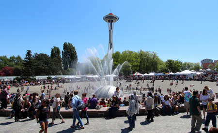 Cooling off in the International Fountain, Seattle Centre. Northwest Folklife Festival, Memorial Day Weekend 2012.のeditorial素材