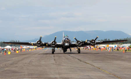 ARLINGTON - JULY 14  A B17 Flying Fortress Bomber flew at the Arlington Fly In airshow on 14 July 2012 in Arlington Washington Stateのeditorial素材