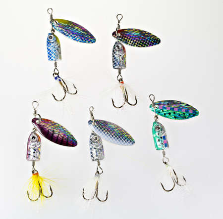 an assortment of fishing spinner lures