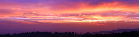 early morning sunrise with mist in the valley