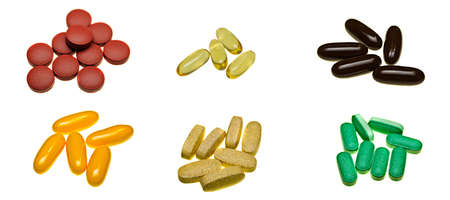 A selection of pill tablets isolated on white
