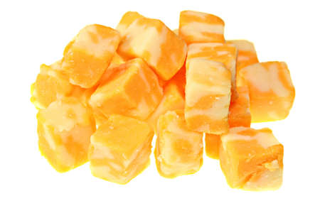 Cudes of Colby Cheese isolated on whiteの写真素材