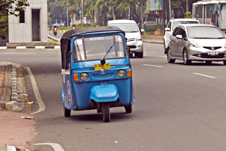 JAKARTA - MAY 8  tuk tuk motorized rickshaw common form of public transport in South East Asia, on...