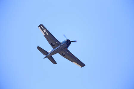 EVERETT -  JUNE 29  A restored World War 2 Grumman F6F-5 Hellcat was seeing flying in the skies over Everett Paine Field on 29 June 2013 near Seattle, WA のeditorial素材