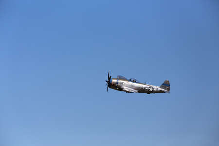 ARLINGTON -  JULY 13  A restored World WarII P-47 D Tunderbolt was seeing flying in the skies over...