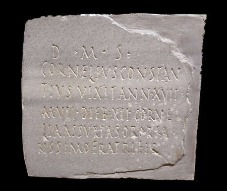 2nd Century AD Roman fumeral stone  Dedication to the Manes gods, Cornelius Constantius lived for 17 years, 7 months and 12 days  His sister Cornelia Assuria has done this dedicationのeditorial素材
