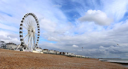 Brighton beach front and ferris wheelの写真素材