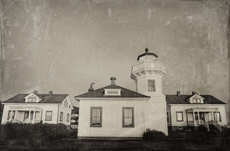 Historic Mulkiteo Lighthouse Station with lighthouse and keeperの写真素材