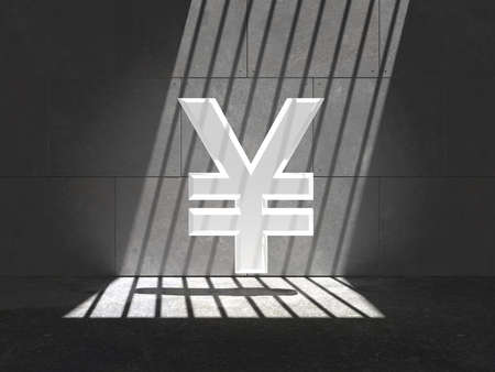 Bright Yen symbol trapped in a cell, lit by natural sunlight through bars の写真素材