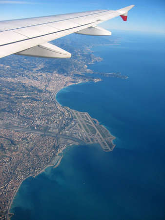 An aerial view of Nice Airport and French riviera from an airplane, flying back to US.の写真素材