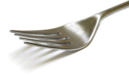 Stainless Steel Fork close up with shallow DOF isolated on white background
