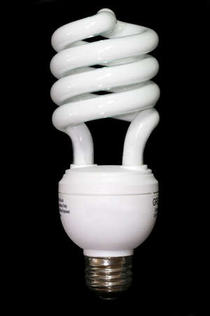 Energy Saving light bulb isolated on a black background.