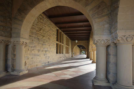 Long Corridor of Arches along an opened courtyardの写真素材
